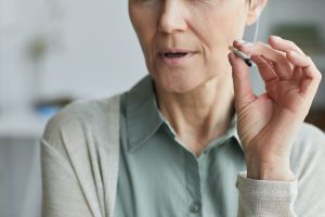 Senior Woman Smoking at Home